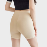 Jupe short sous robe couleur chair