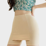 Jupe short sous robe couleur chair